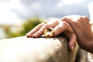 Hand-Holding-Wedding-Ring