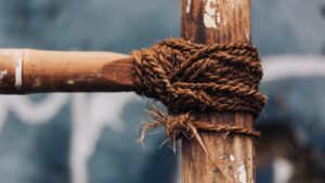 a rope wrapped around a wooden pole